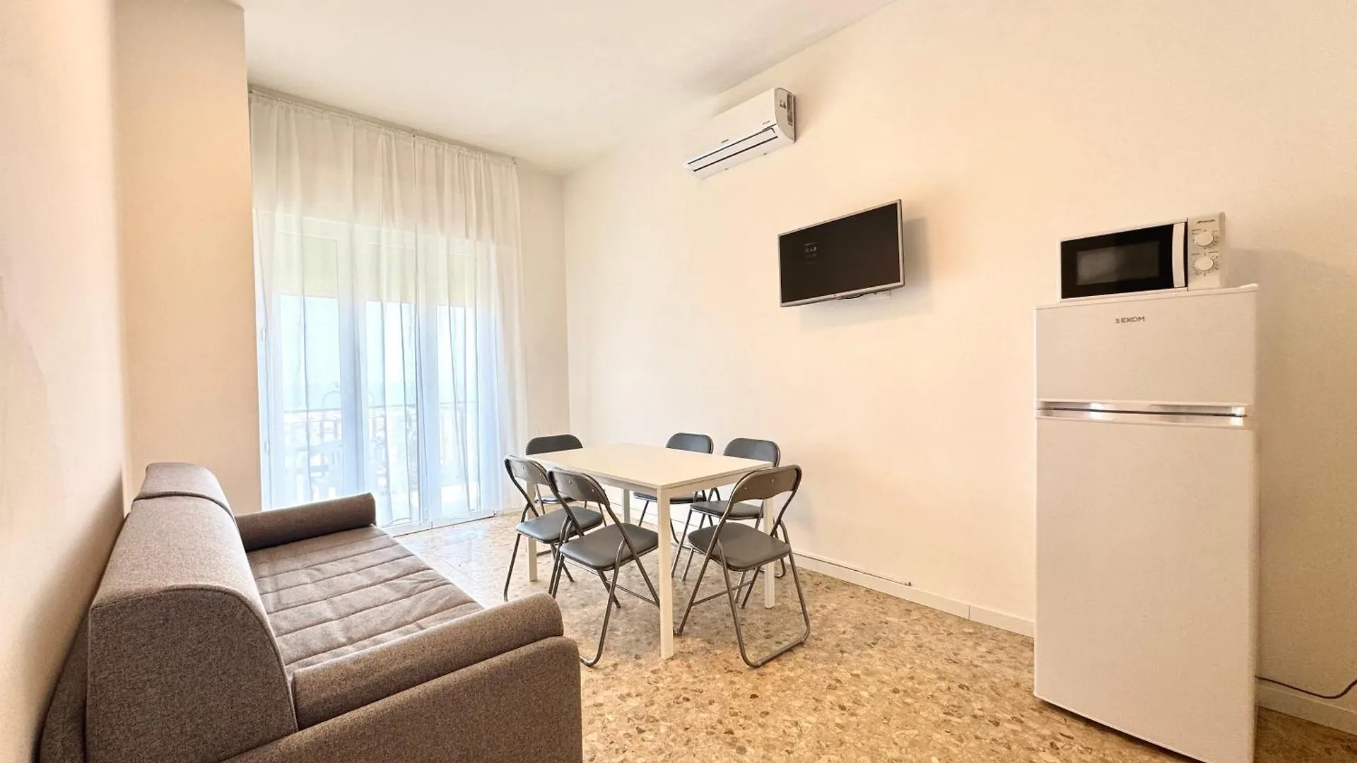 Villa Fronte Mare-Carraro Immobiliare Jesolo - Family Apartments Olaszország